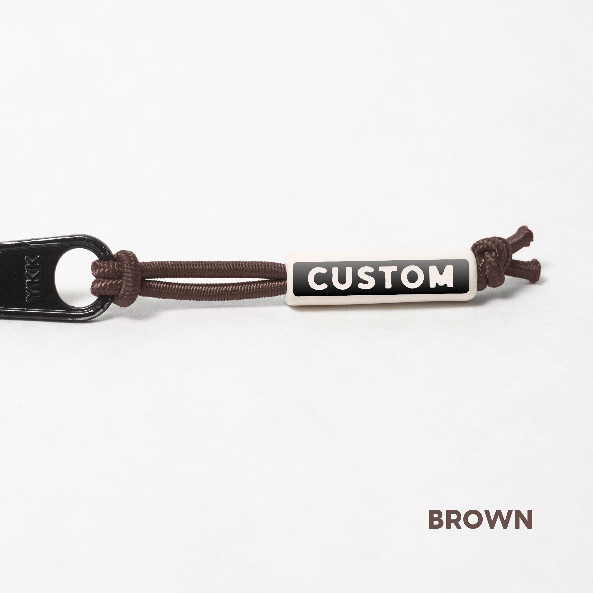 Active Gear Zippers Tags on Stretch Cord