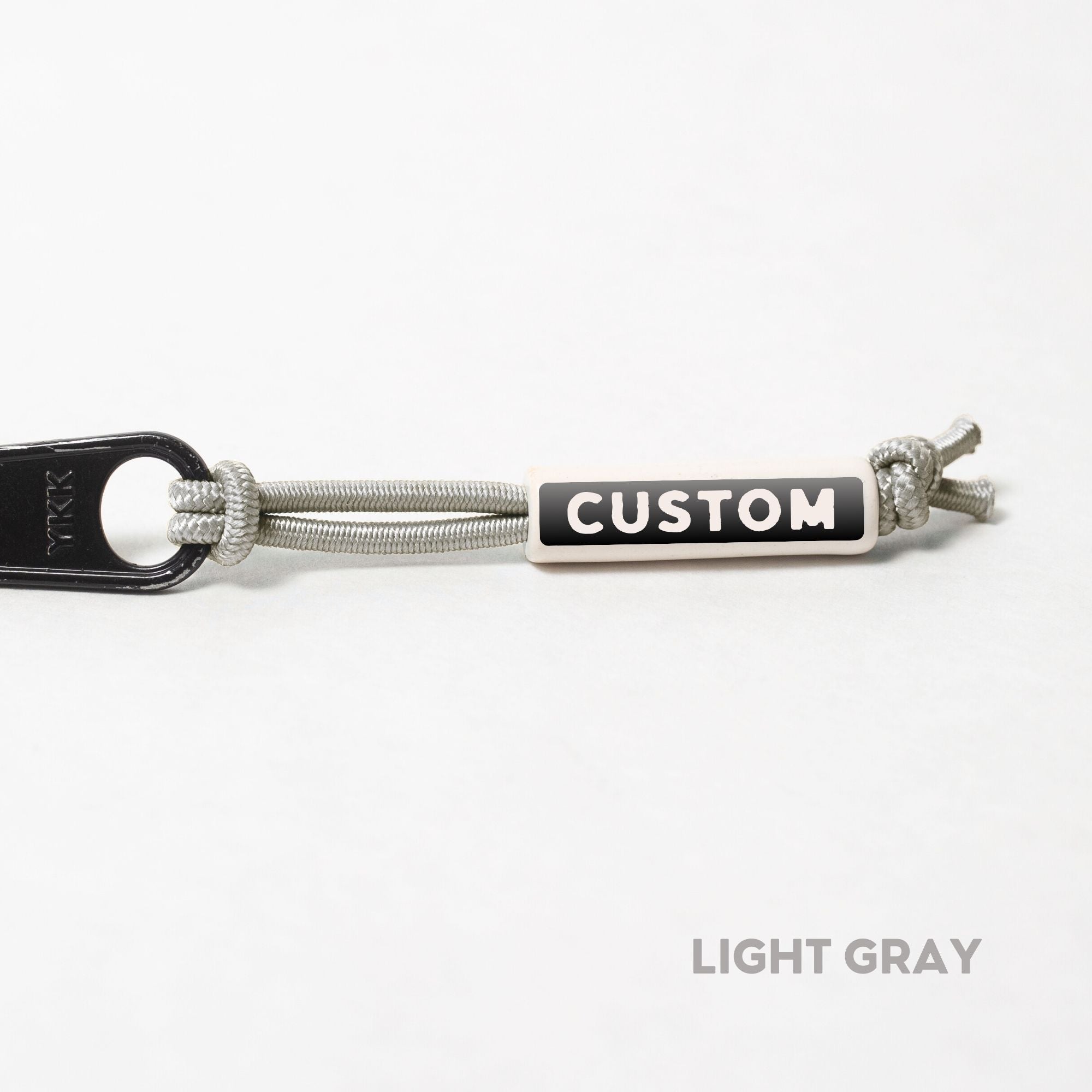 Active Gear Zippers Tags on Stretch Cord