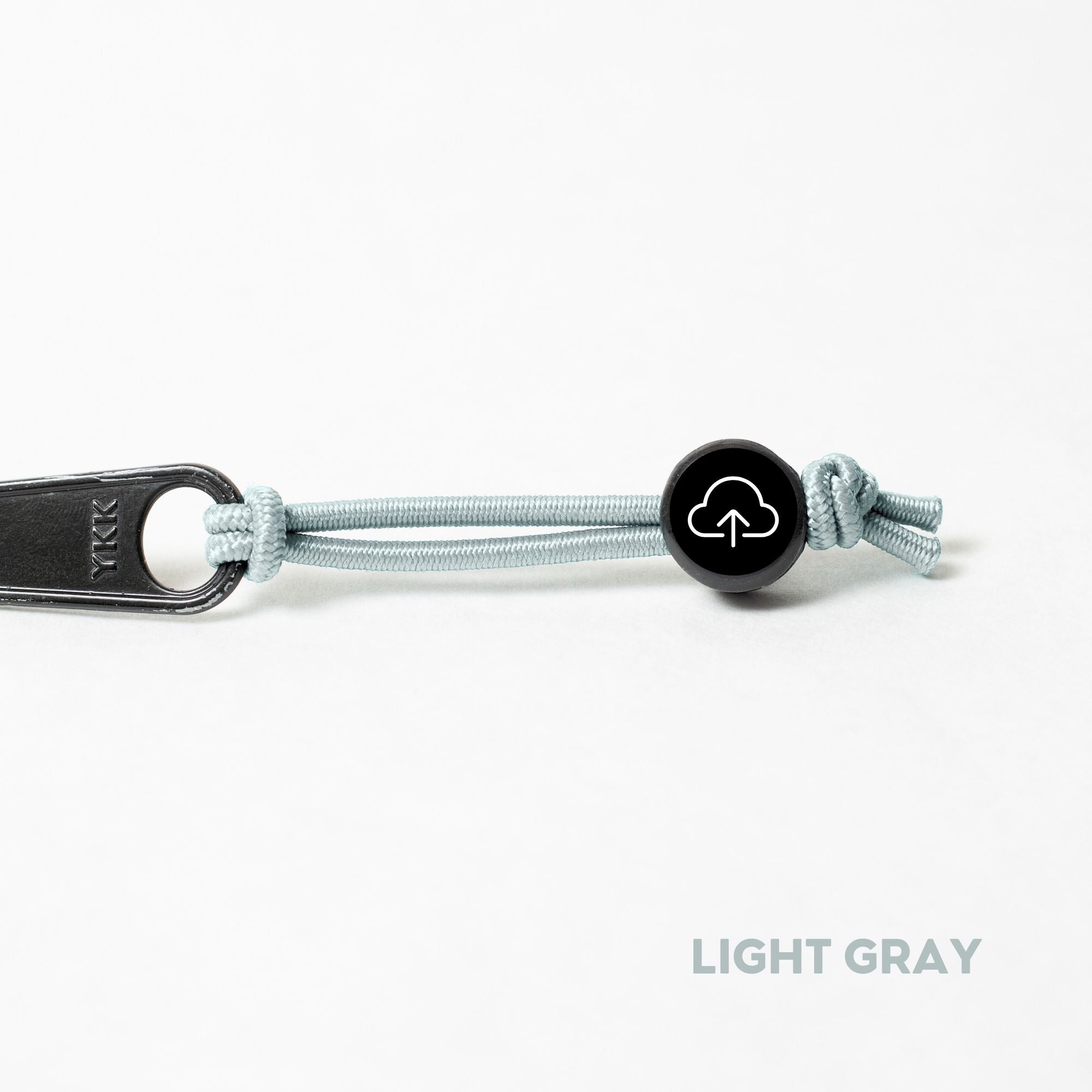 Tap Beacon Zipper Tags on Stretch Cord