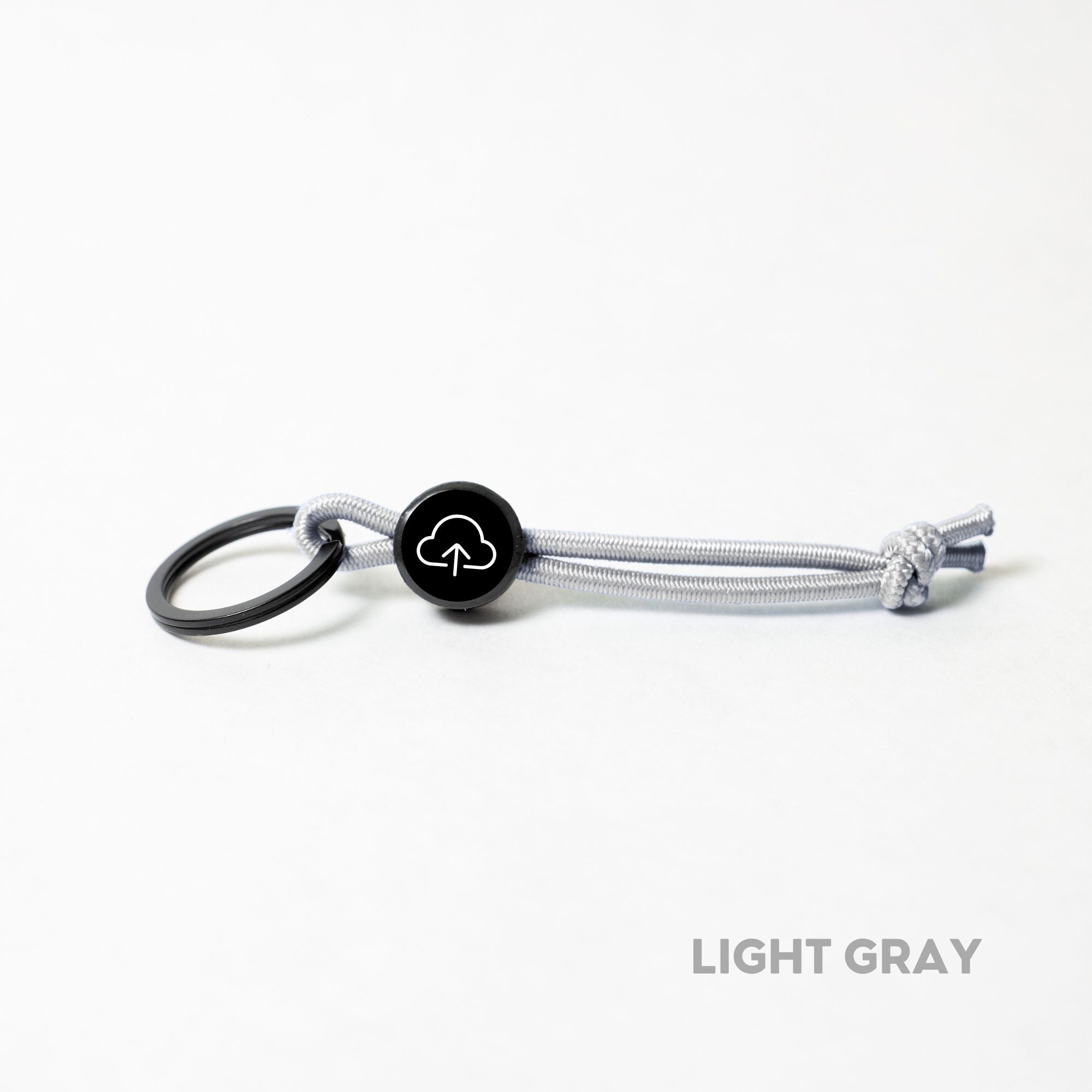 Tap Beacon Keychains on Stretch Cord