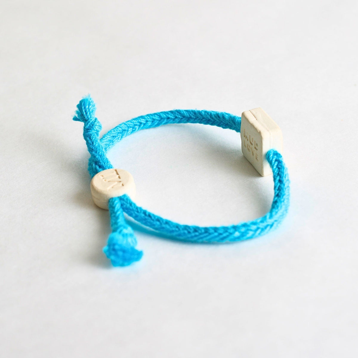 Tap-to-Phone Bracelets on Bold Weave - Cream Clay Square