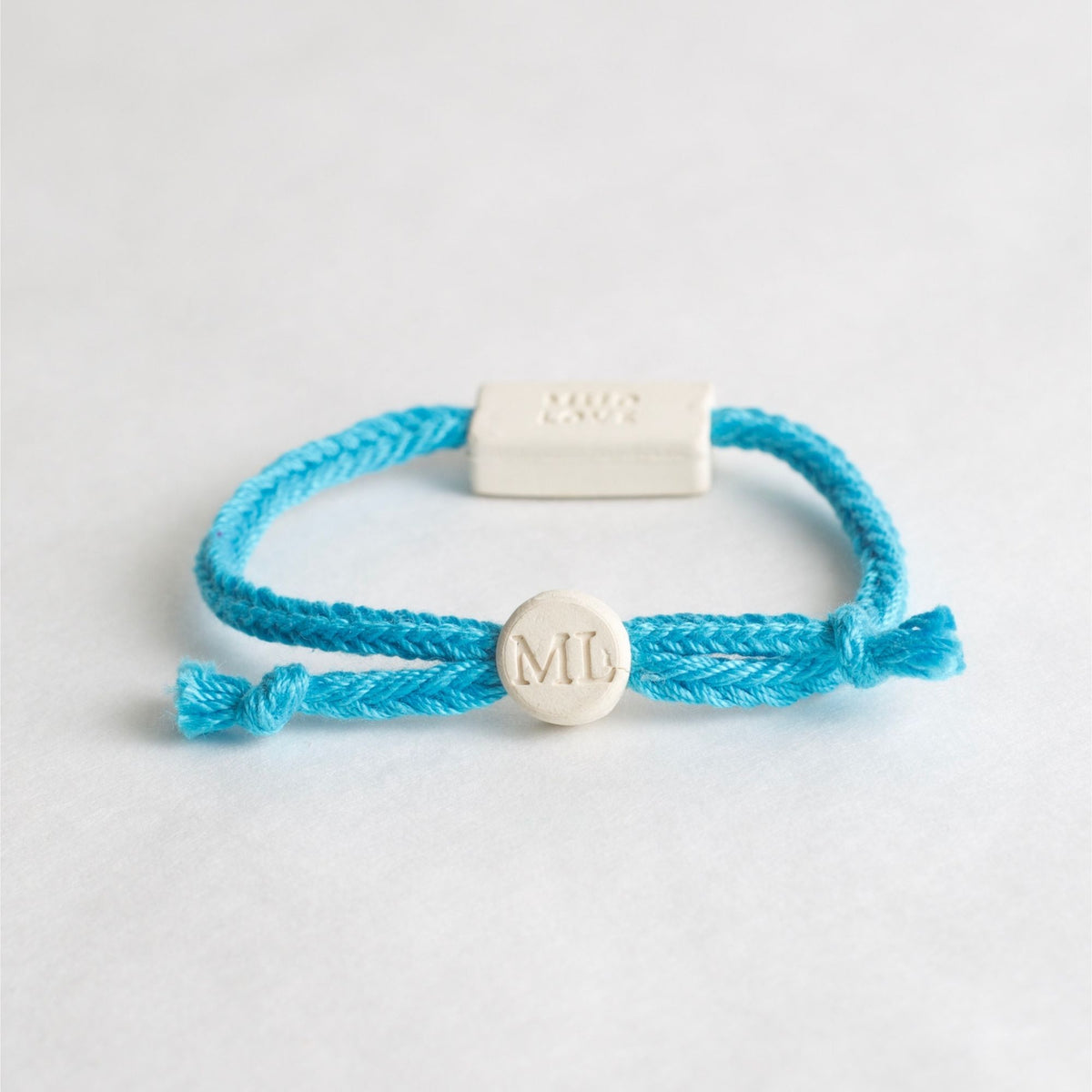 Tap-to-Phone Bracelets on Bold Weave - Cream Clay Square