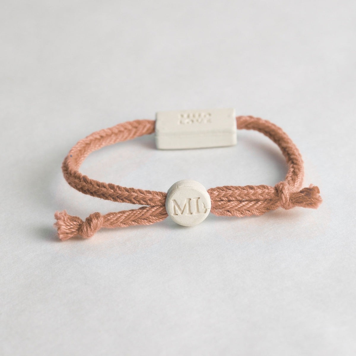 Tap-to-Phone Bracelets on Bold Weave - Cream Clay Circle