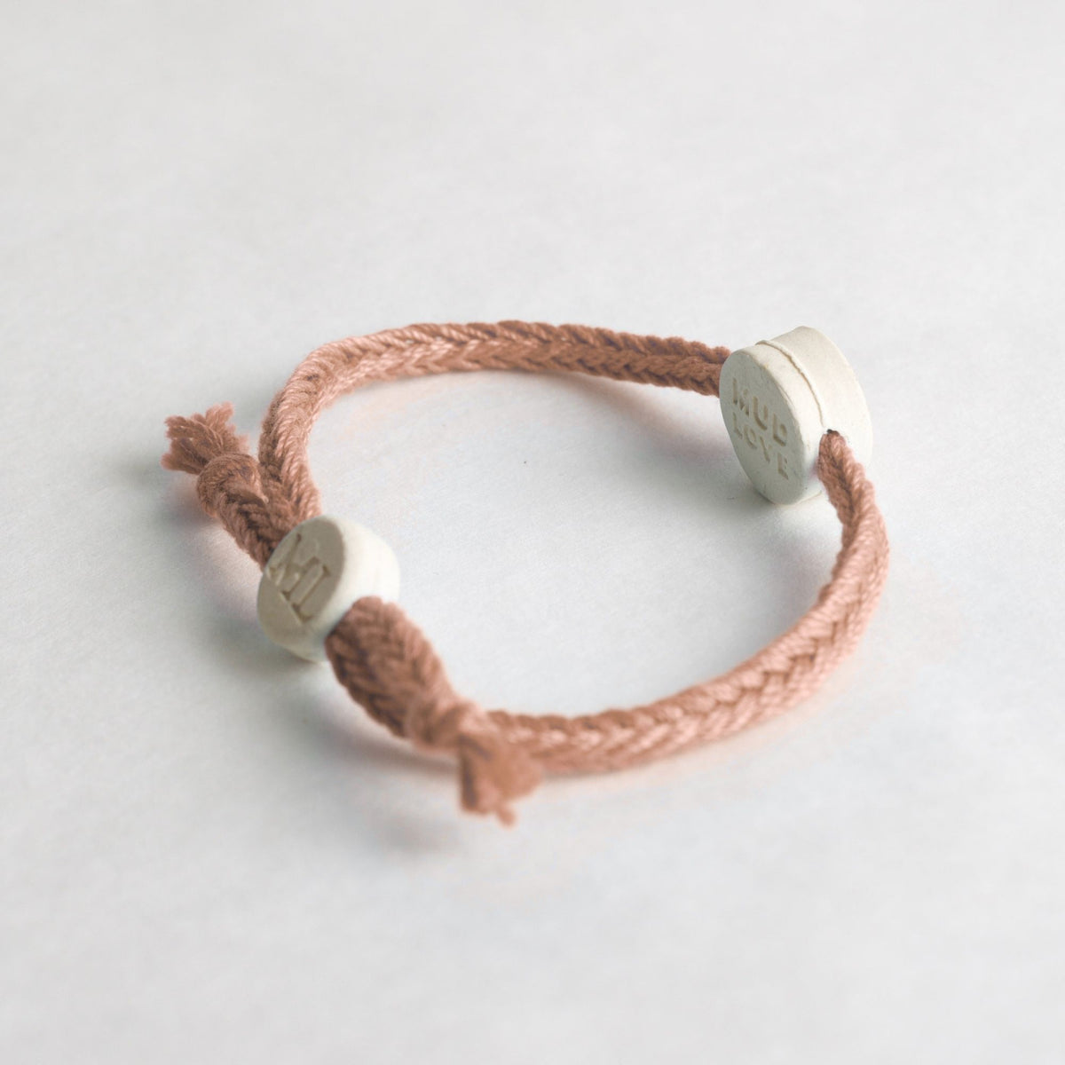 Tap-to-Phone Bracelets on Bold Weave - Cream Clay Circle