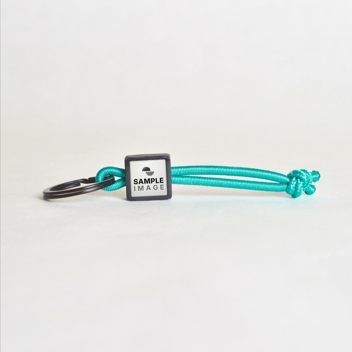 Tap-to-Phone Keychains on Active Bungee - Charcoal Clay Square
