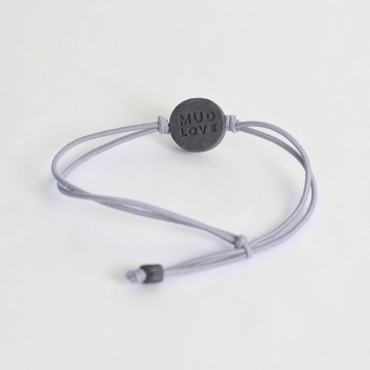 Tap-to-Phone Bracelets on Lite Bungee - Charcoal Clay Circle