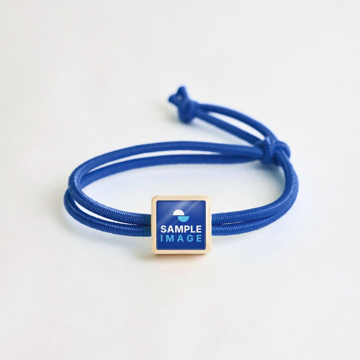 Tap-to-Phone Bracelets on Active Bungee - Cream Clay Square