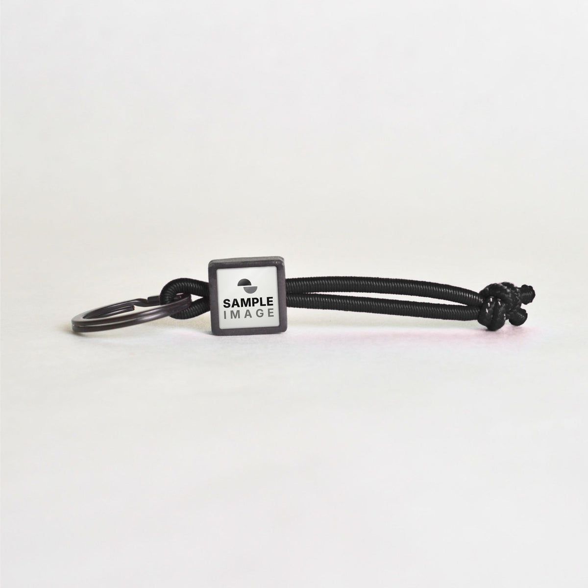 Tap-to-Phone Keychains on Active Bungee - Charcoal Clay Square