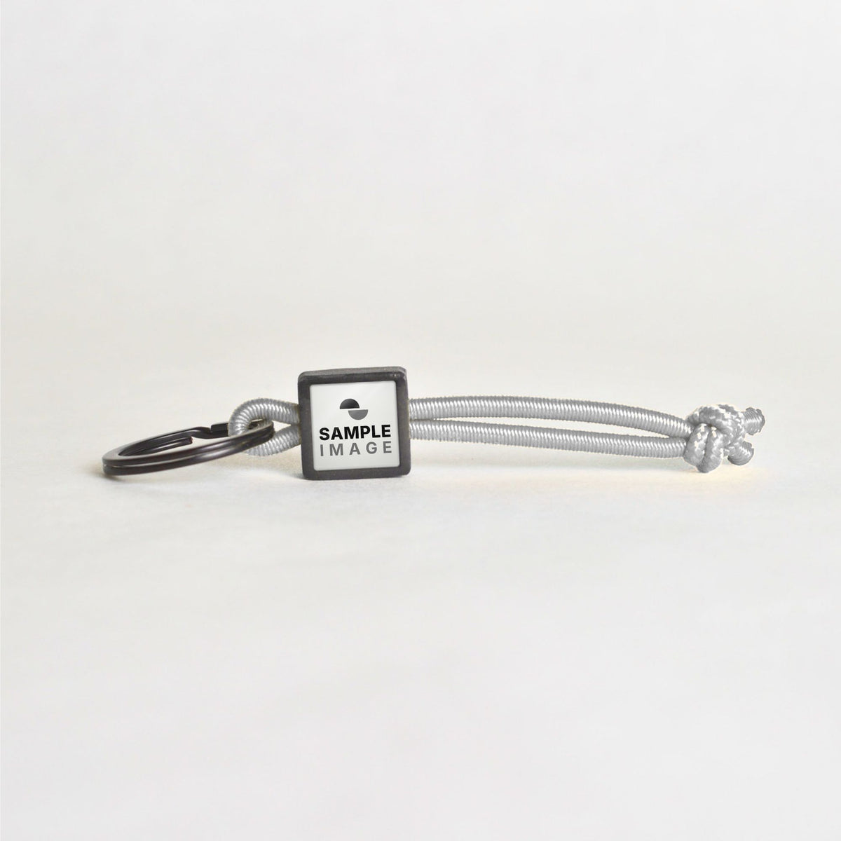 Tap-to-Phone Keychains on Active Bungee - Charcoal Clay Square