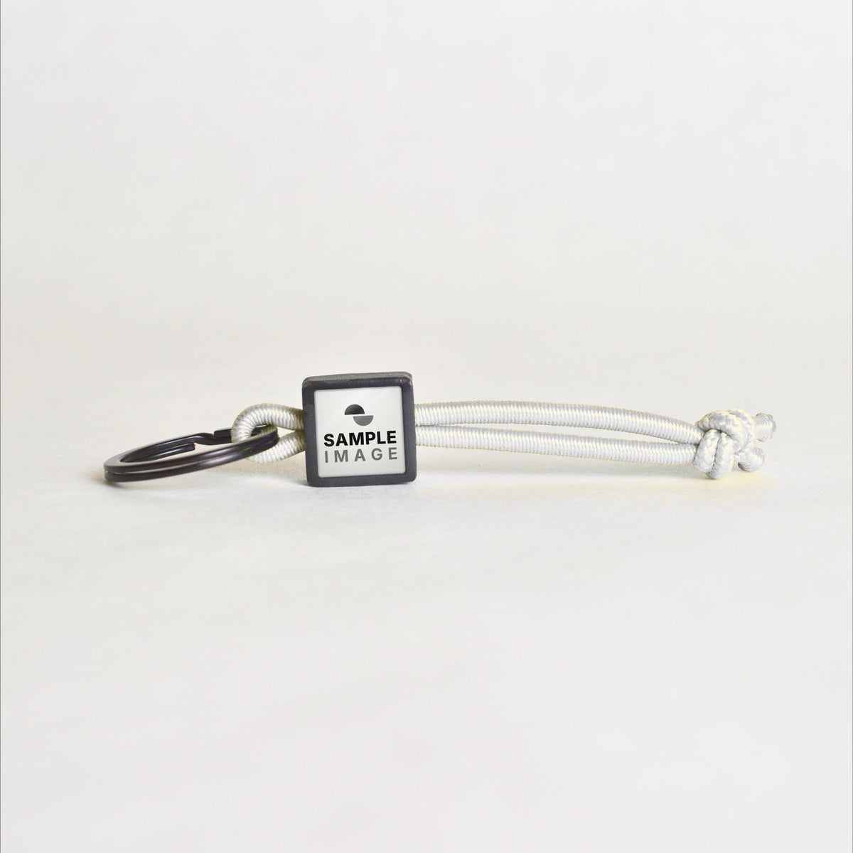 Tap-to-Phone Keychains on Active Bungee - Charcoal Clay Square