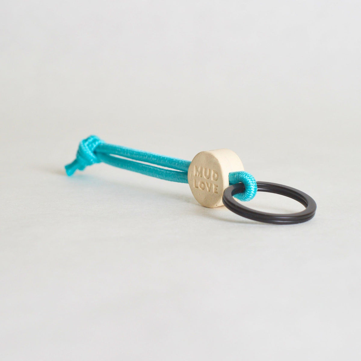 Tap-to-Phone Keychains on Active Bungee - Cream Clay Circle