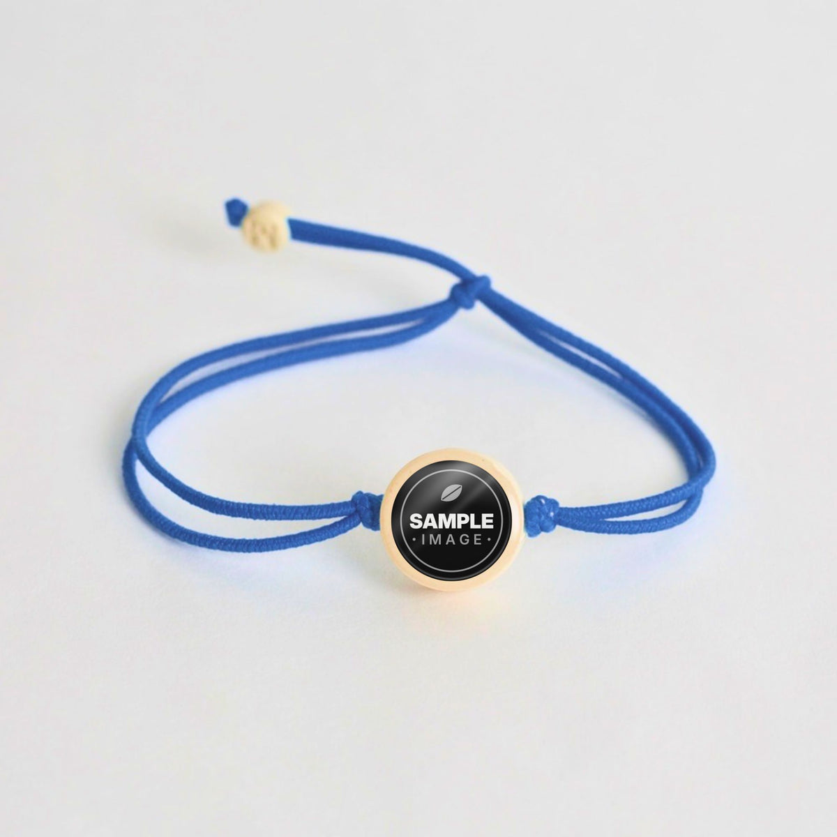 Tap-to-Phone Bracelets on Lite Bungee - Cream Clay Circle