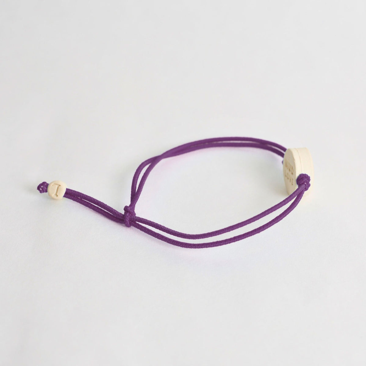 Tap-to-Phone Bracelets on Lite Bungee - Clay Circle